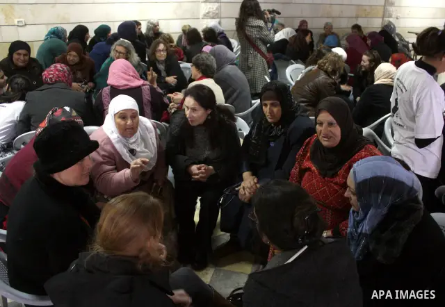 Palestinian and israeli women take part in a Palestinian_Jewish conference of the occasion of the 100th International Womens Day on March 12,2011 in Beit Omar village near the West Bank city of Hebron. Photo by Najeh Has...