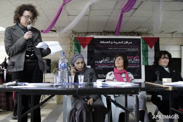 Palestinian and israeli women take part in a Palestinian_Jewish conference of the occasion of the 100th International Womens Day on March 12,2011 in Beit Omar village near the West Bank city of Hebron. Photo by Najeh Has...