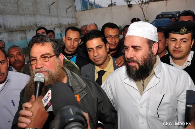 Egyptian Abbud and Tareq al-Zomor, members of Egypt's Islamic Jihad, are seen after being released form the Tura jail, in Hilwan on the outskirts of Cairo, on March 12, 2011, after Egypt's new military rulers ordered the...