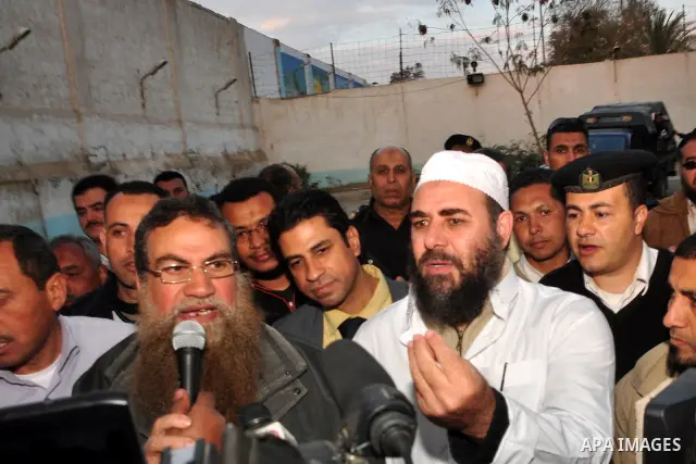 Egyptian Abbud and Tareq al-Zomor, members of Egypt's Islamic Jihad, are seen after being released form the Tura jail, in Hilwan on the outskirts of Cairo, on March 12, 2011, after Egypt's new military rulers ordered the...