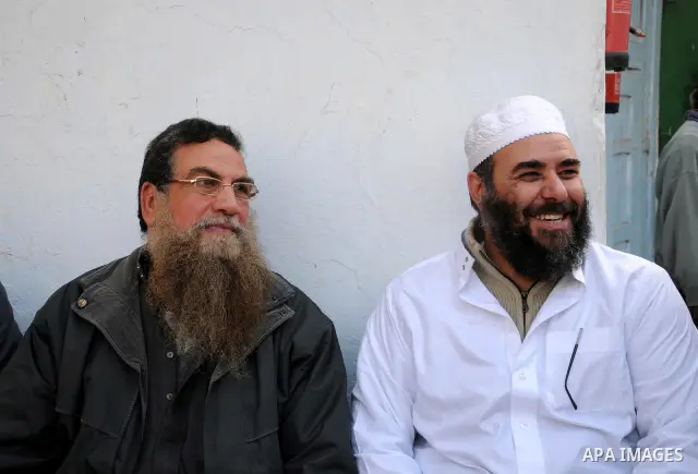 Egyptian Abbud and Tareq al-Zomor, members of Egypt's Islamic Jihad, are seen after being released form the Tura jail, in Hilwan on the outskirts of Cairo, on March 12, 2011, after Egypt's new military rulers ordered the...