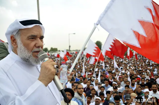 Tens of thousands of Bahraini anti-government protesters converged from two directions Saturday, March 12, 2011, to demonstrate outside the walls of King Hamad bin Isa Al Khalifa's Safriya palace in Sadad, Bahrain, south...