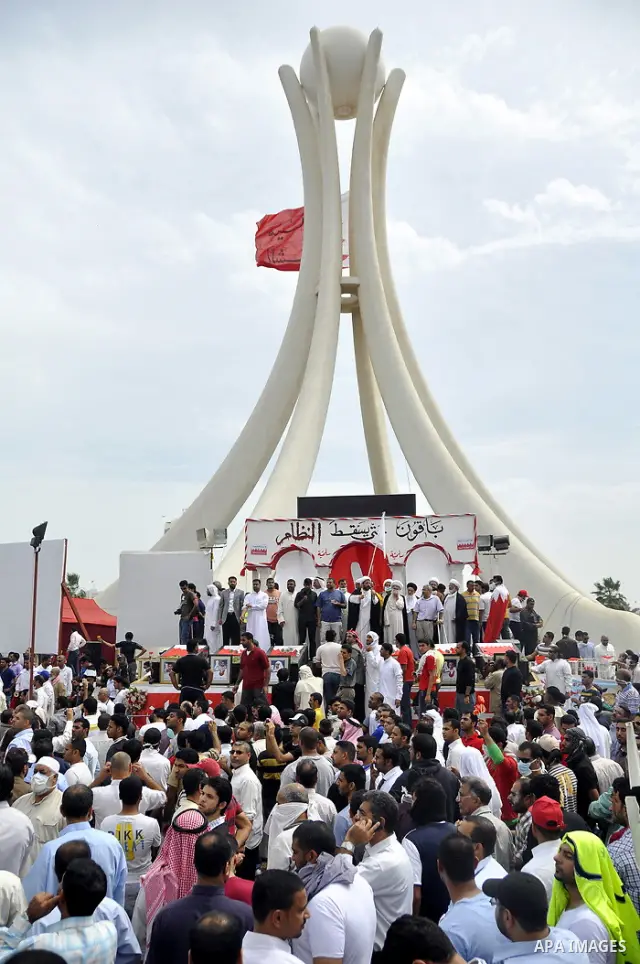 Bahraini anti-government protesters demonstrate near the Pearl roundabout Sunday, March 13, 2011, in Manama, Bahrain. Photo by Ammar A.rasool