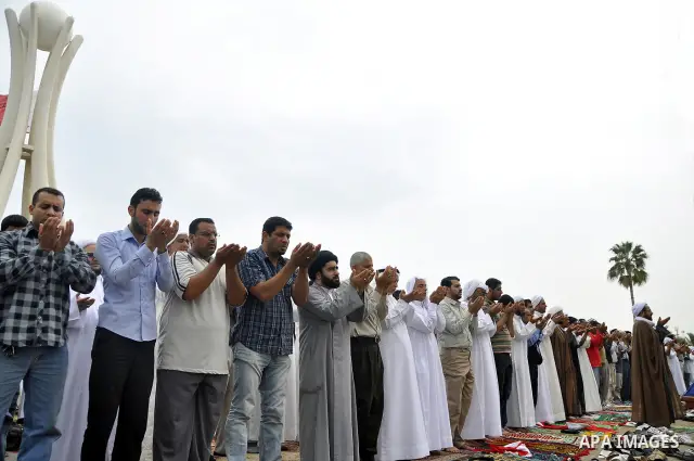 Bahraini anti-government protesters demonstrate near the Pearl roundabout Sunday, March 13, 2011, in Manama, Bahrain. Photo by Ammar A.rasool