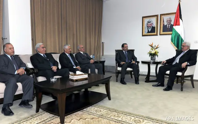 Palestinian President Mahmoud Abbas (Abu Mazen) meets with delegation from the Palestinian Monetary Authority in Rammallah in west bank March 14, 2011. Photo by Thaer Ganaim