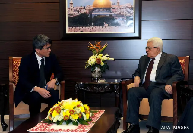 Palestinian President Mahmoud Abbas (Abu Mazen) meets with the Japanese Ambassador in Ramallah in west bank March14,2011 Photo by Thaer Ganaim