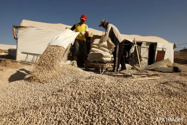 Palestinian men smuggle gravels into the Gaza Strip through a tunnel under the Egypt-Gaza border in Rafah on March 14, 2011. Israel's blockade of the Gaza Strip was imposed after the militant Hamas group violently seized...