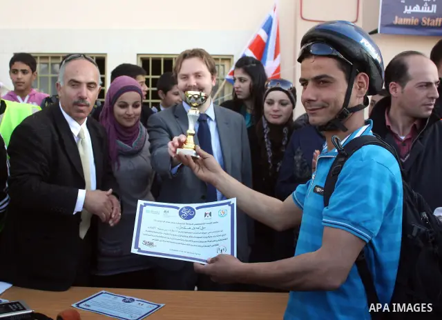 Palestinians compete during cycling race in the West Bank city of Hebron on March 14,2011.This event is the first of it kind on the local level and it was organized by the Palestinian Ministery of youth and sport as a pr...