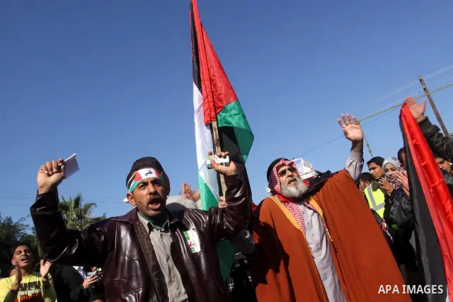 Palestinians youths take apart during a rally calling for a reconciliation between the rival Palestinian leading factions Hamas in Gaza and Fatah in the West Bank, in Gaza City Hundreds of youths demonstrated in the stre...