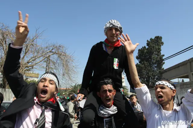 Palestinian demonstrators take part in a protest calling for Palestinian political unity between Gaza's Hamas rulers and the Fatah-dominated Palestinian Authority which rules from Ramallah, on March 15, 2011in Gaza City,...