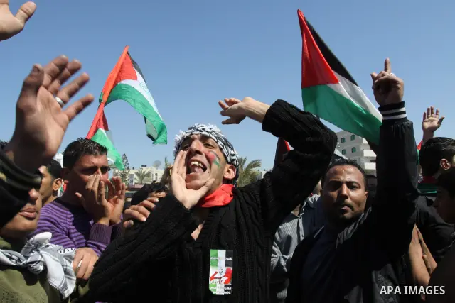 Palestinian demonstrators take part in a protest calling for Palestinian political unity between Gaza's Hamas rulers and the Fatah-dominated Palestinian Authority which rules from Ramallah, on March 15, 2011in Gaza City,...