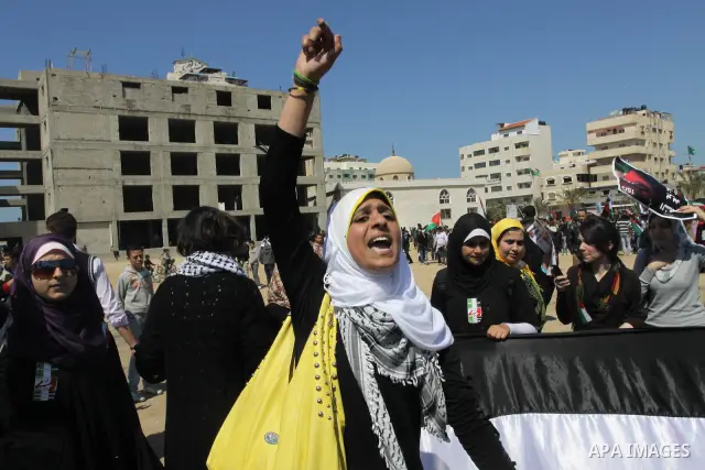 Palestinian demonstrators take part in a protest calling for Palestinian political unity between Gaza's Hamas rulers and the Fatah-dominated Palestinian Authority which rules from Ramallah, on March 15, 2011in Gaza City,...