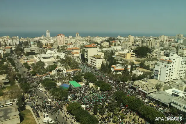 A general view shows Palestinian demonstrators taking part in a protest calling for Palestinian political unity between Gaza's Hamas rulers and the Fatah-dominated Palestinian Authority which rules from Ramallah, on Marc...