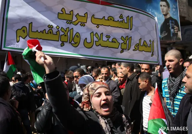 Hamas , Fatah parliamentary lawmakers and Palestinian demonstrators take part in a protest calling for Palestinian political unity between Gaza's Hamas rulers and the Fatah-dominated Palestinian Authority which rules fro...