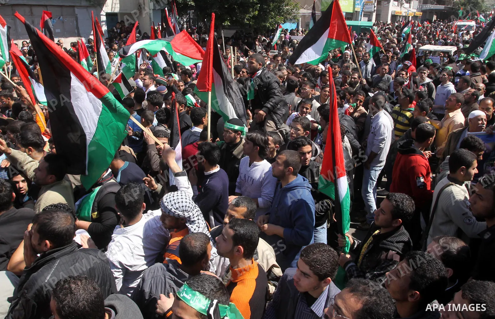 Palestinian demonstrators take part in a protest calling for Palestinian political unity between Gaza's Hamas rulers and the Fatah-dominated Palestinian Authority which rules from Ramallah, on March 15, 2011in Gaza City,...