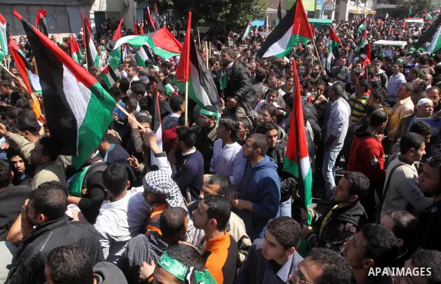 Palestinian demonstrators take part in a protest calling for Palestinian political unity between Gaza's Hamas rulers and the Fatah-dominated Palestinian Authority which rules from Ramallah, on March 15, 2011in Gaza City,...