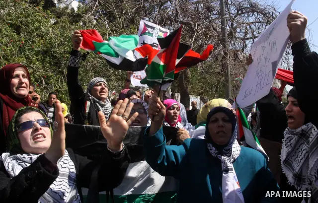 Palestinian demonstrators take part in a protest calling for Palestinian political unity between Gaza's Hamas rulers and the Fatah-dominated Palestinian Authority which rules from Ramallah, on March 15, 2011in Gaza City,...