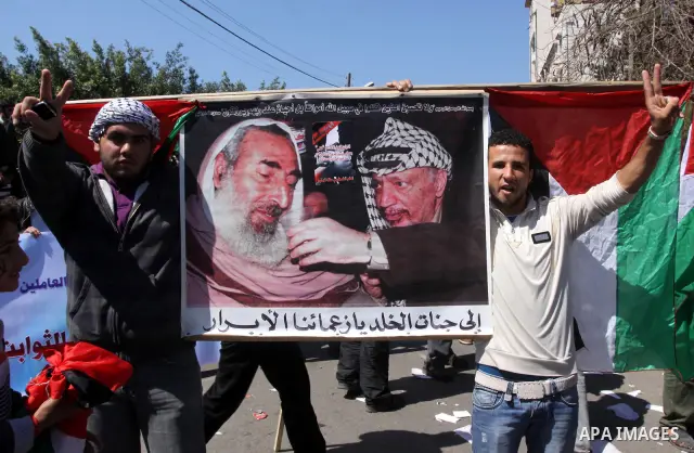 Palestinian demonstrators take part in a protest calling for Palestinian political unity between Gaza's Hamas rulers and the Fatah-dominated Palestinian Authority which rules from Ramallah, on March 15, 2011in Gaza City,...