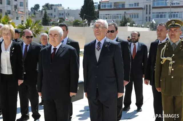 Cypriot President Dimitris Christofias lays a wreath at the tomb of the late Palestinian leader Yasser Arafat in the West Bank city of Ramallah March 15, 2011. Christofias is on an official visit to Israel and the Palest...