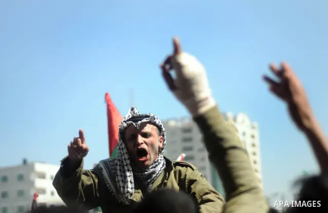 Palestinian demonstrators take part in a protest calling for Palestinian political unity between Gaza's Hamas rulers and the Fatah-dominated Palestinian Authority which rules from Ramallah, on March 15, 2011in Gaza City,...