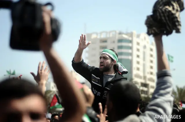 Palestinian demonstrators take part in a protest calling for Palestinian political unity between Gaza's Hamas rulers and the Fatah-dominated Palestinian Authority which rules from Ramallah, on March 15, 2011in Gaza City,...
