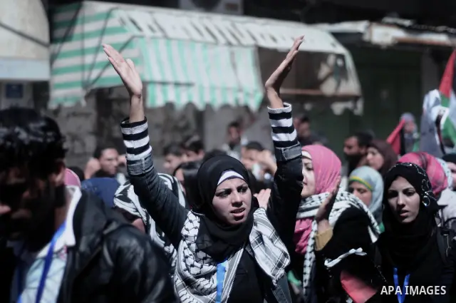 Palestinian demonstrators take part in a protest calling for Palestinian political unity between Gaza's Hamas rulers and the Fatah-dominated Palestinian Authority which rules from Ramallah, on March 15, 2011in Gaza City,...