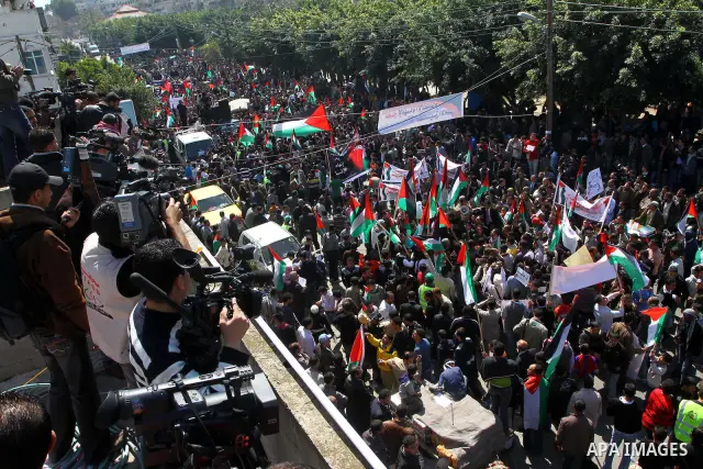 Palestinian demonstrators take part in a protest calling for Palestinian political unity between Gaza's Hamas rulers and the Fatah-dominated Palestinian Authority which rules from Ramallah, on March 15, 2011in Gaza City,...