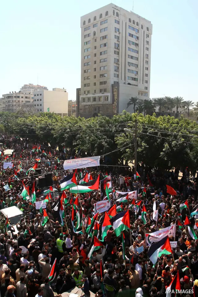 Palestinian demonstrators take part in a protest calling for Palestinian political unity between Gaza's Hamas rulers and the Fatah-dominated Palestinian Authority which rules from Ramallah, on March 15, 2011in Gaza City,...