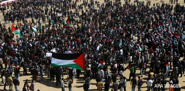 Palestinian demonstrators take part in a rally calling for Palestinian political unity between Gaza's Hamas rulers and the Fatah-dominated Palestinian Authority which rules from Ramallah, on March 15, 2011in Gaza City, a...