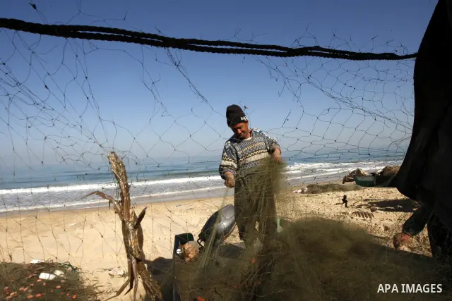 Palestinian fisherman on the coast of Rafah in the southern Gaza Strip on March 16, 2011. Israel said Tuesday it seized a cargo ship loaded with weapons sent by Iran to Palestinian militants in Gaza, including sophistica...