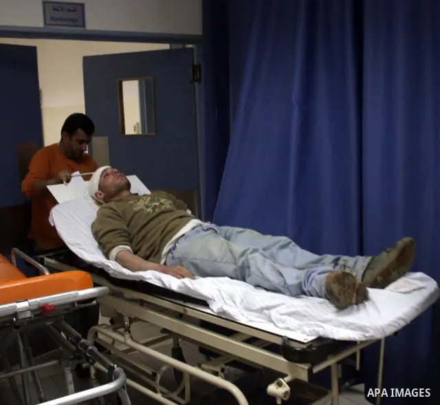 Palestinian Sami Snuber 31 receives medical treatment at a hospital in Ramallah, West Bank, on March 17, 2011. Snuber apparently was attacked by sticks and hit on his head by Israeli settlers from the West Bank settlemen...