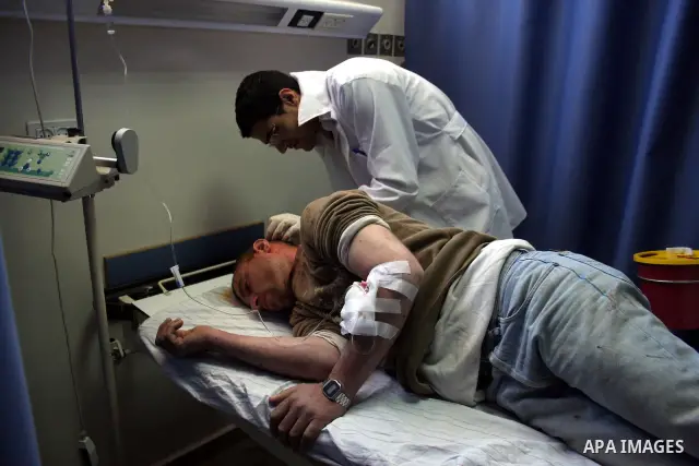 Palestinian Sami Snuber 31 receives medical treatment at a hospital in Ramallah, West Bank, on March 17, 2011. Snuber apparently was attacked by sticks and hit on his head by Israeli settlers from the West Bank settlemen...