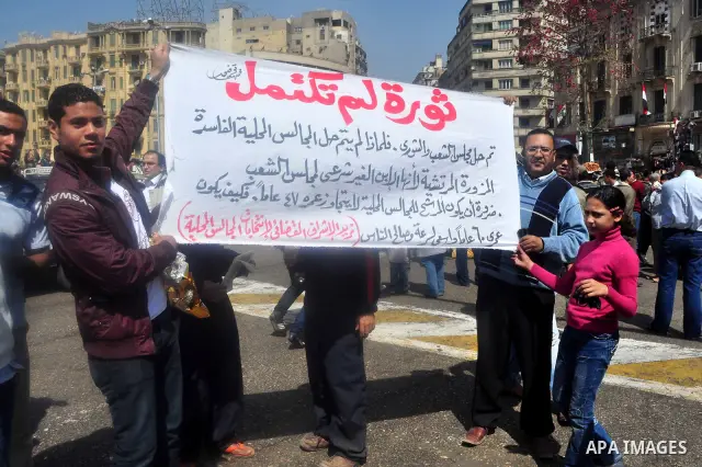 Egyptians shout anti- constitutional amendments slogans during a protest at Tahrir Square in Cairo, Egypt, Friday, March 18, 2011 a day before the referendum . Civic groups have raised fears that the timing of a Saturday...