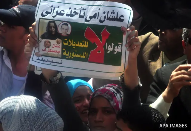 Egyptians shout anti- constitutional amendments slogans during a protest at Tahrir Square in Cairo, Egypt, Friday, March 18, 2011 a day before the referendum . Civic groups have raised fears that the timing of a Saturday...