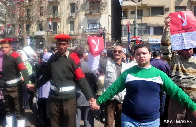 Egyptians shout anti- constitutional amendments slogans during a protest at Tahrir Square in Cairo, Egypt, Friday, March 18, 2011 a day before the referendum . Civic groups have raised fears that the timing of a Saturday...