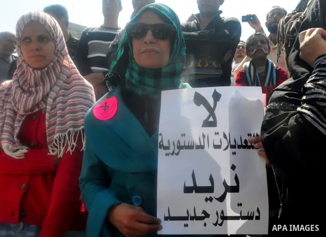 Egyptians shout anti- constitutional amendments slogans during a protest at Tahrir Square in Cairo, Egypt, Friday, March 18, 2011 a day before the referendum . Civic groups have raised fears that the timing of a Saturday...