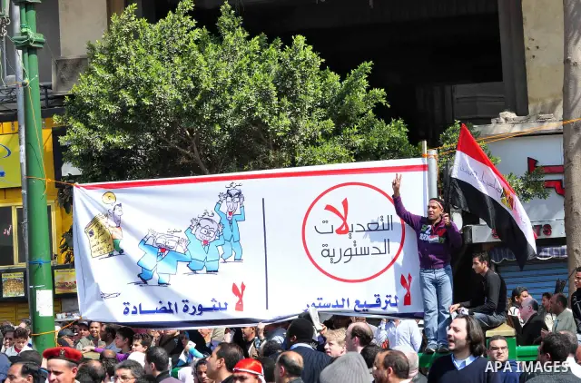 Egyptians shout anti- constitutional amendments slogans during a protest at Tahrir Square in Cairo, Egypt, Friday, March 18, 2011 a day before the referendum . Civic groups have raised fears that the timing of a Saturday...