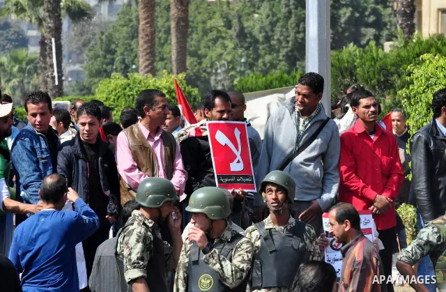 Egyptians shout anti- constitutional amendments slogans during a protest at Tahrir Square in Cairo, Egypt, Friday, March 18, 2011 a day before the referendum . Civic groups have raised fears that the timing of a Saturday...