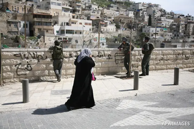 Israeli soldiers fire tear gas canisters towards Palestinian demonstrators during the clashes after Friday prayers in Jerusalem's neighbourhood of silwan on March 18, 2011. Photo by Sliman Khader