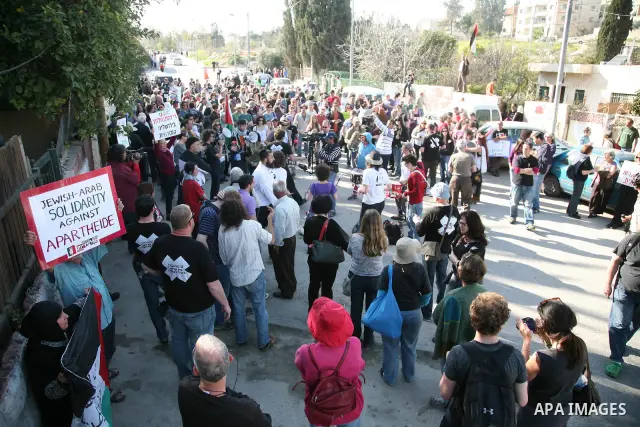 Palestinians and foreign activists take part in the weekly demonstration in the neighborhood of Sheikh Jarrah in East Jerusalem on March 18, 2011. Photo by Sliman Khader