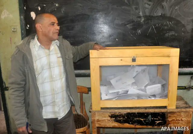 Egyptians cast their vote during a national referendum, at a school in Cairo. Egyptians flocked to the polls on Saturday in a historic referendum on changes to the constitution. The amendments were proposed by a judicial...