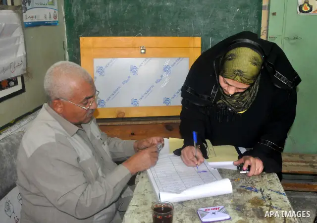 Egyptians cast their vote during a national referendum, at a school in Cairo. Egyptians flocked to the polls on Saturday in a historic referendum on changes to the constitution. The amendments were proposed by a judicial...