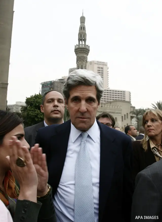 US senator John Kerry greets Egyptians as he visits Tahrir Square, the focal point of Egyptian uprising, in Cairo, Egypt, Sunday, March 20, 2011. Kerry hold talks with Egypt's military rulers, the Supreme Council of the...
