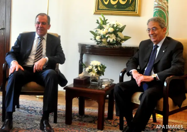 Arab League Secretary General Amr Moussa meets with Russian Foreign Minister Sergei Lavrov at the Arab League headquarters in Cairo, Egypt, 21 March 2011. Russian Foreign Minister Sergei Lavrov is on a tour of the Middle...