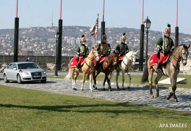 Palestinian President Mahmoud Abbas and Hungarian President Pal Schmitt review an honour guard in front of the presidental palace in Budapest on March 21, 20011 during a welcoming ceremony. The Palestinian National Counc...