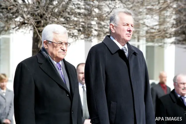 Palestinian President Mahmoud Abbas and Hungarian President Pal Schmitt review an honour guard in front of the presidental palace in Budapest on March 21, 20011 during a welcoming ceremony. The Palestinian National Counc...