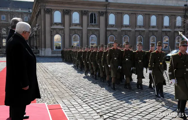 Palestinian President Mahmoud Abbas and Hungarian President Pal Schmitt review an honour guard in front of the presidental palace in Budapest on March 21, 20011 during a welcoming ceremony. The Palestinian National Counc...