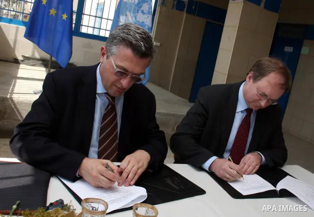 EU representative to the Palestinian Authority, Christian Berger and UNRWA Commissioner-General, Filippo Grandi sign an agreement with 40 million euros during a private visit to the village of Walajah near the West Bank...