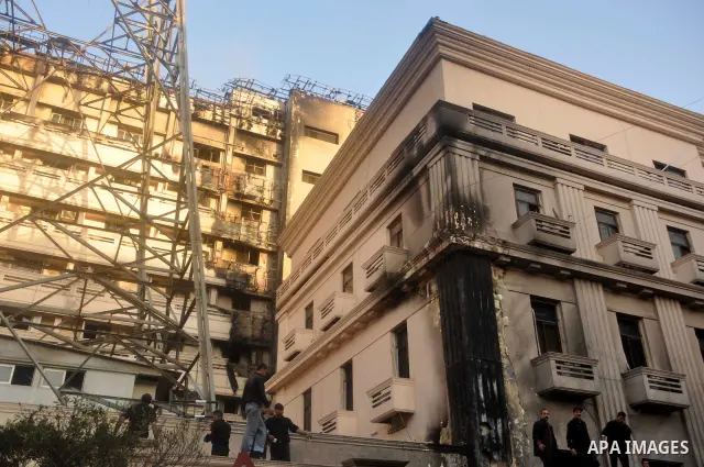 Egyptian firefighters operate on one of the building of the Interior Ministry after a fire erupted, in Cairo, Egypt, 22 March 2011. Egypt's Interior Ministry building was set ablaze by disgruntled police officers on 22 M...