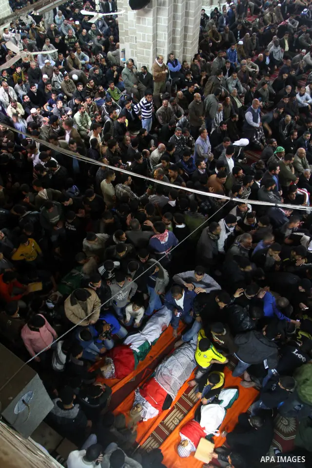 Palestinian mourners attend a funeral at a mosque in Gaza City on March 23, 2011 a day after eight Gazans were killed, among them two minors and four militants, as tensions soared on the border with Israel after days of...